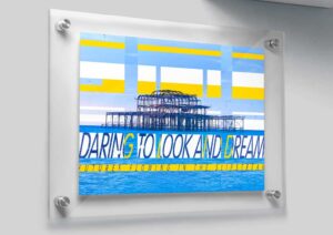 Digital collage poster featuring Brighton's West Pier and a caption saying "Daring to look and dream, futures flowing in the slipstream"